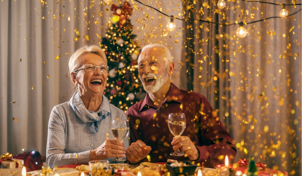 events new years mature couple celebrating new years confetti cheers