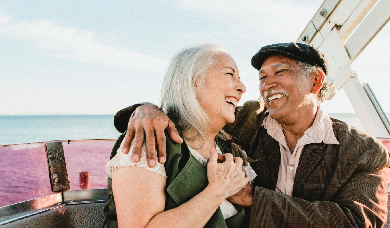 Cheerful senior couple enjoying a Ferris wheel