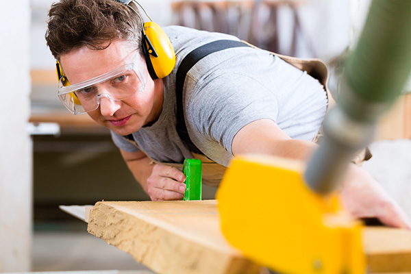Construction Worker with Earmuffs