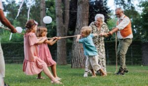 Grandparents have a tug of war with their grandkids Grandparents have a tug of war with their grandkids