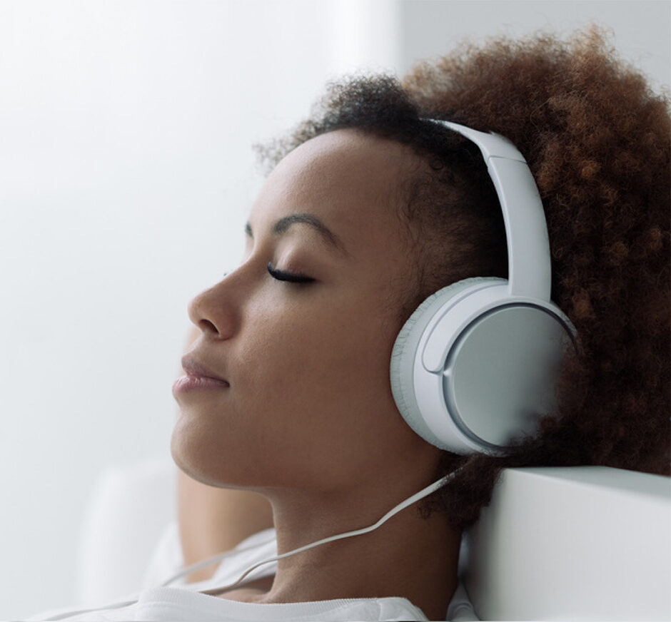 oto person using headphones