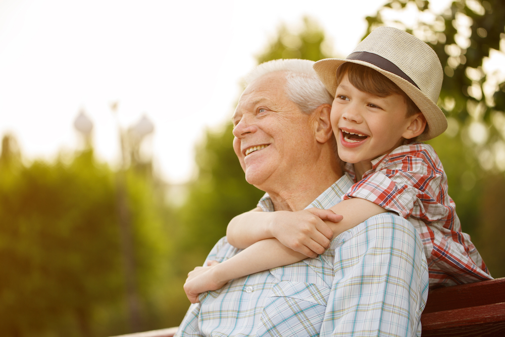 grandfather and grandson having a great time together
