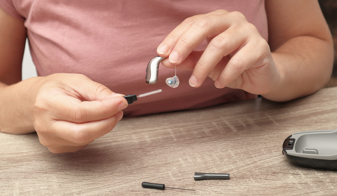 hearing aids cleaning repair maintenance hearing care professional repairing ric hearing aid