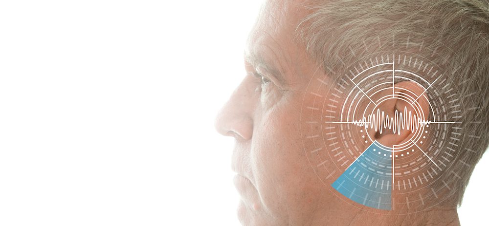 man with ear diagram superimposed on head