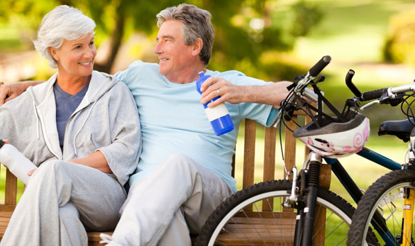 Elderly Couple with Bicycles