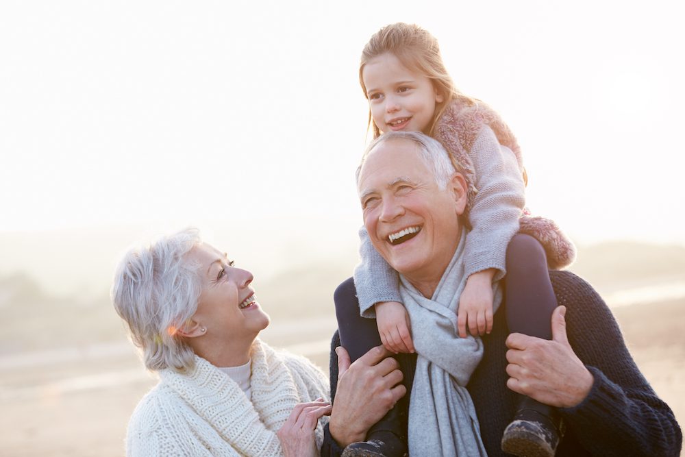 grandparents with their grandkid