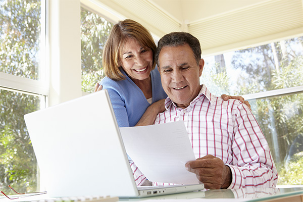Elderly Couple with Laptop