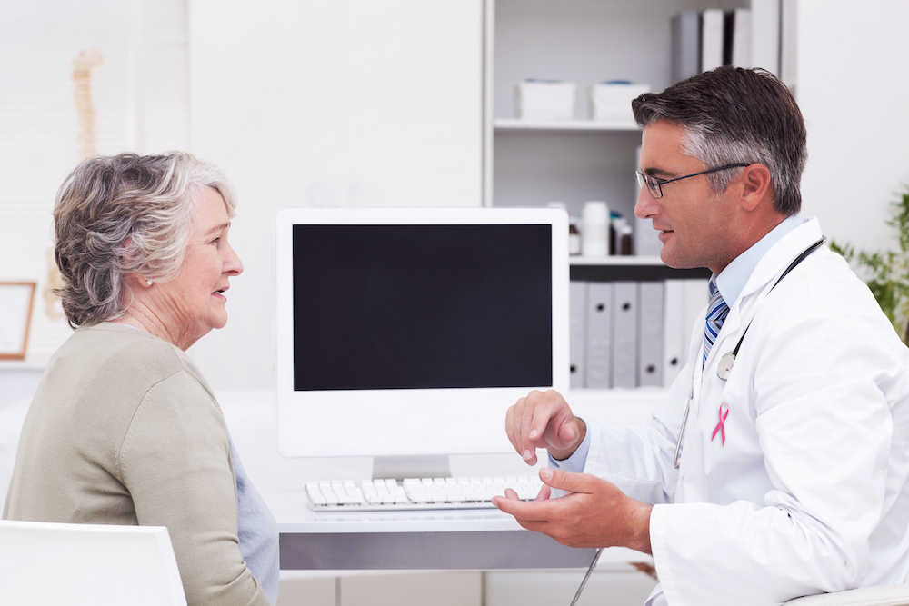 ent specialist treating a patient
