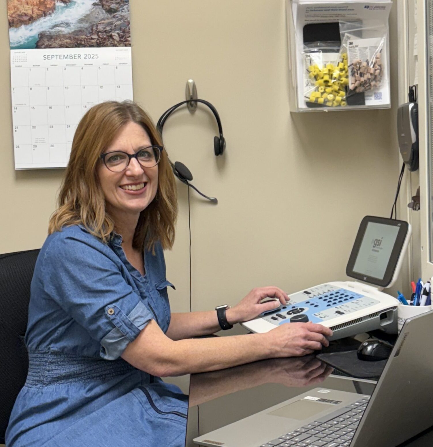 Kim at audiometer