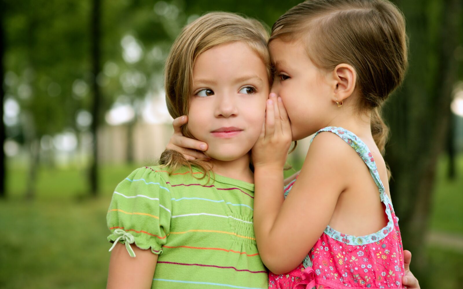 children whispering