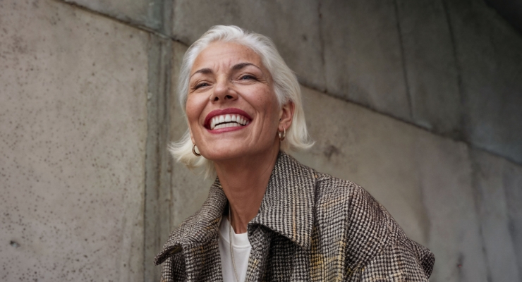 cta stacked oticon zeal caucasian woman wearing AI hearing aids