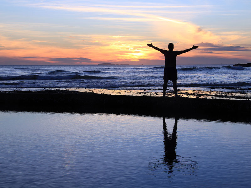 Picture of person standing on the mountain