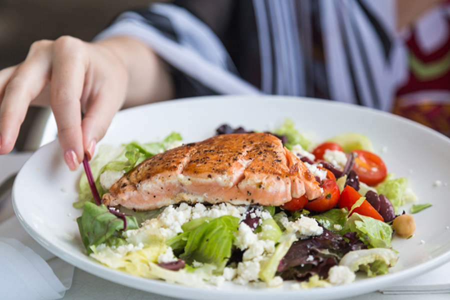 A plate of healthy foods that can prevent or reduce hearing loss..