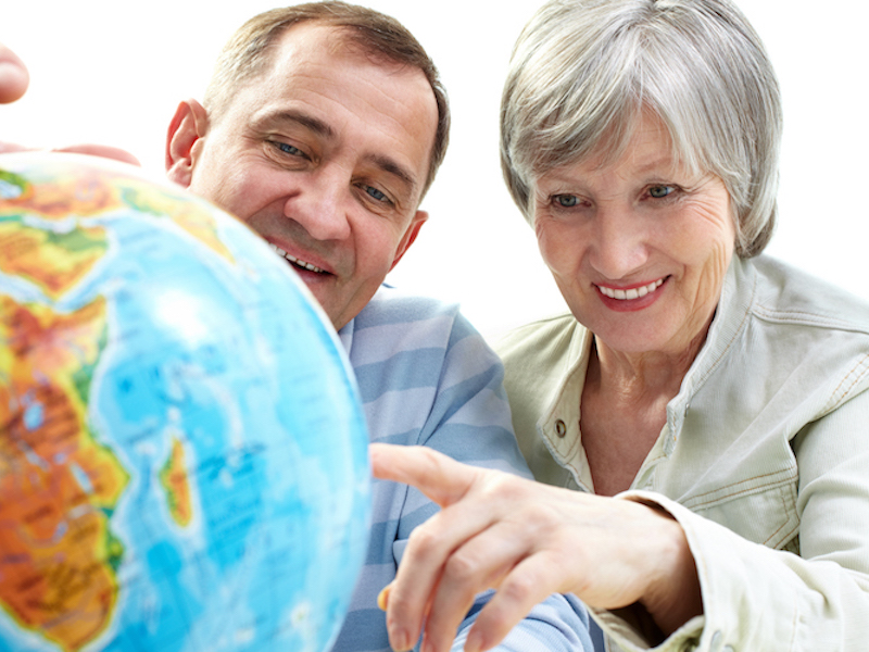 Couple planning to take a trip and enjoy freedom despite needing hearing aids.