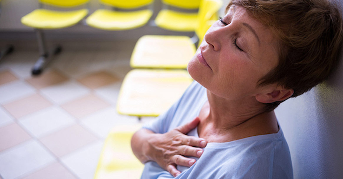 A woman is in pain, but she doesn't realize the cause is her untreated hearing loss.