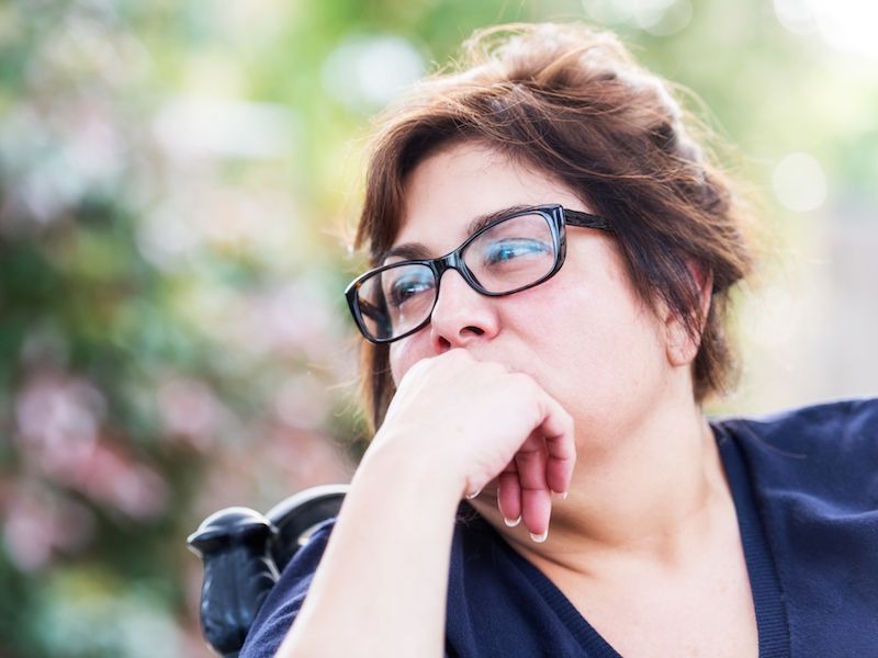 Woman with diabetes thinking about hearing loss.