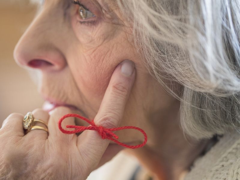 Woman with hearing loss concerned about Alzheimer's disease and dementia.