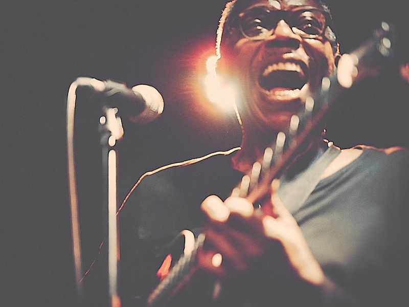Musician protecting his hearing from hearing loss.