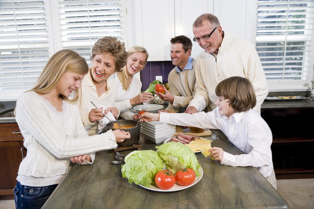family cooking dinner in the kitchen