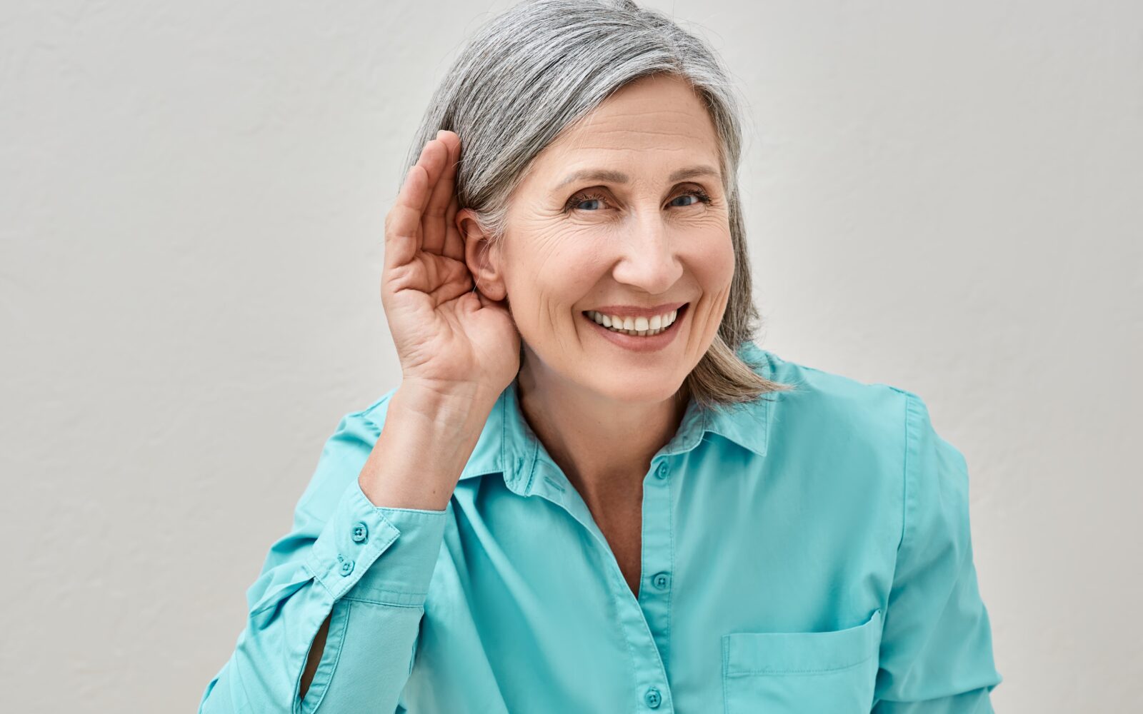 bigstock Mature Woman Listening Sound W 469927899 min