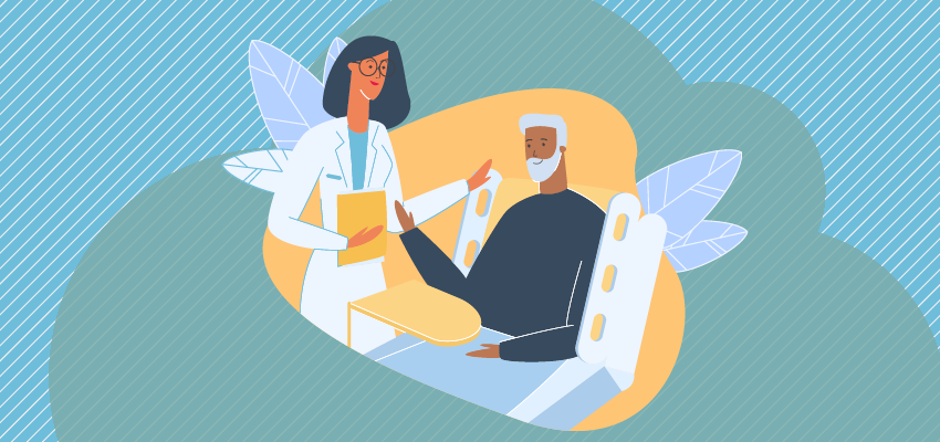 Man in hospital bed takes care of his hearing aids