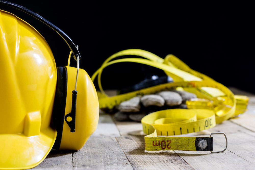 hearing protection displayed on a yellow hardhat