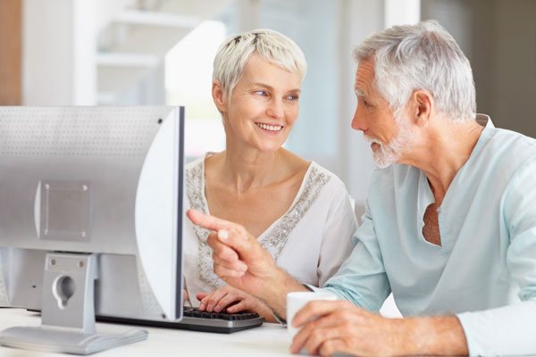 Elderly Couple on Computer