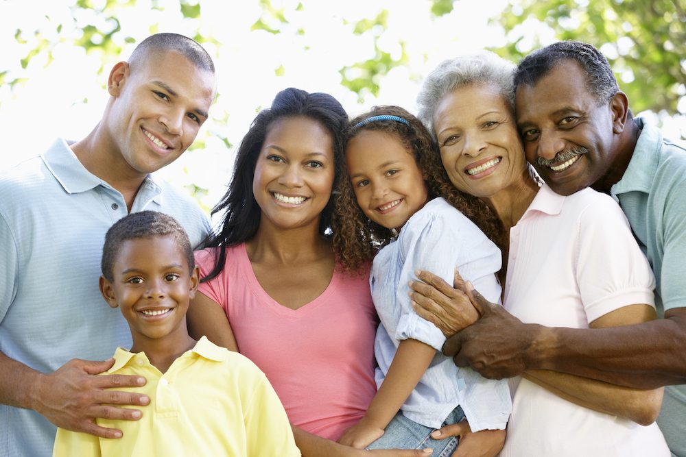 family gathered outside for a group picture