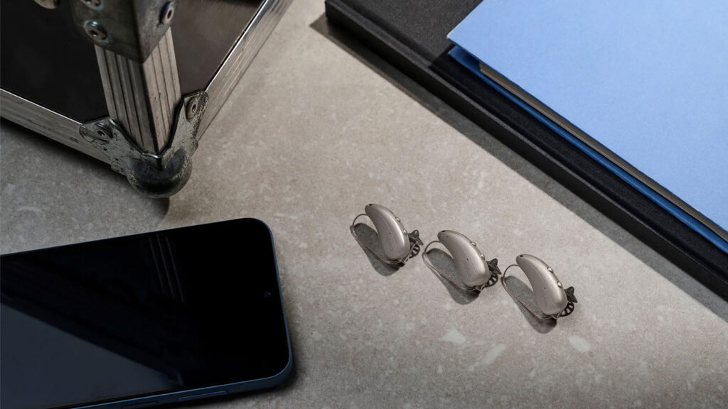 signia pure charge&go ix lifestyle family on table