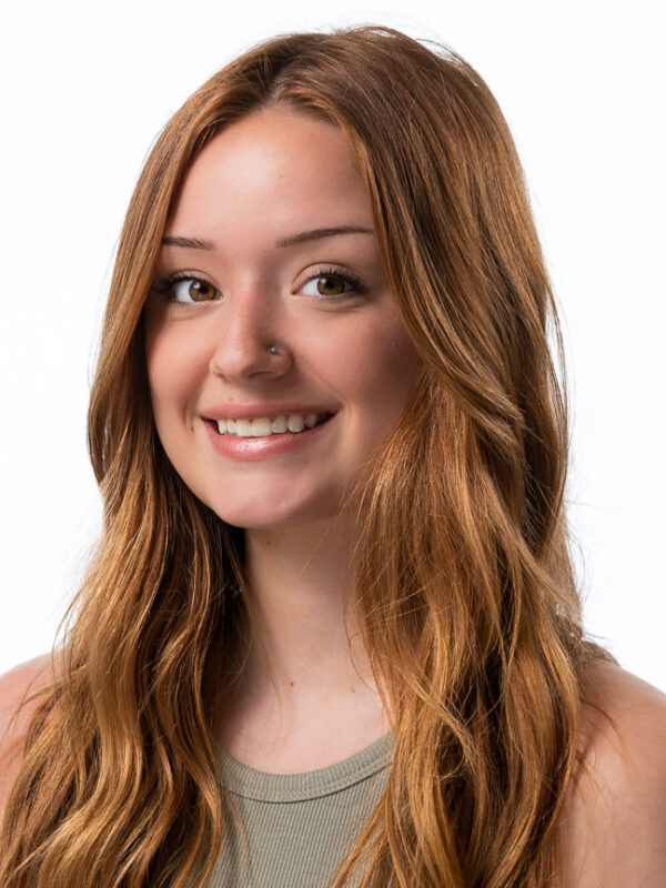 Whitney smiling head shot