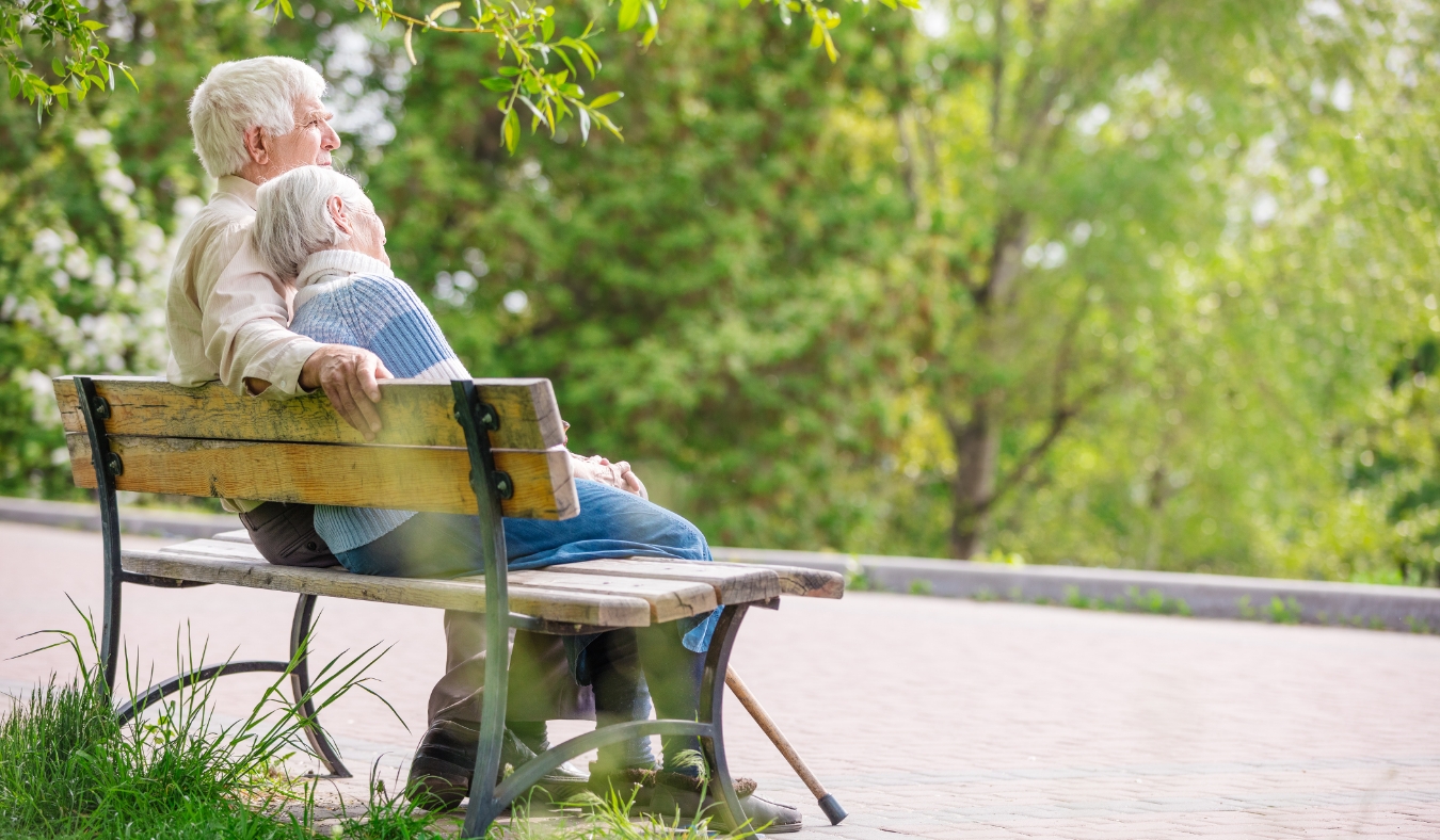 Elderly couple resting at the park