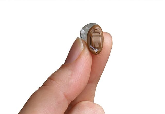 photo collage holding hearing aid