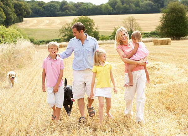 family outside on a farm