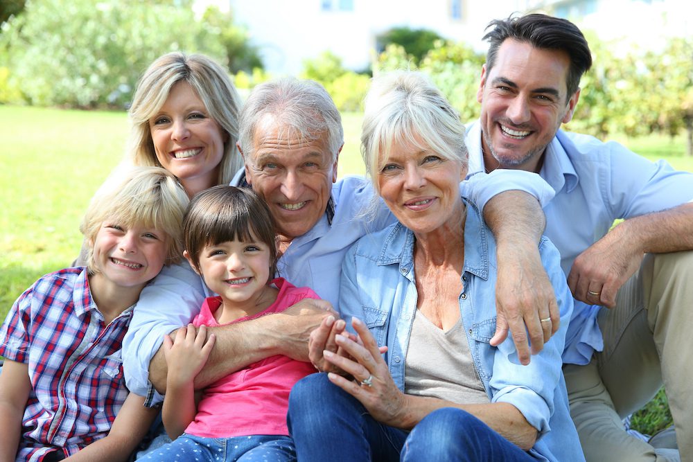 a happy family posing for a group photo