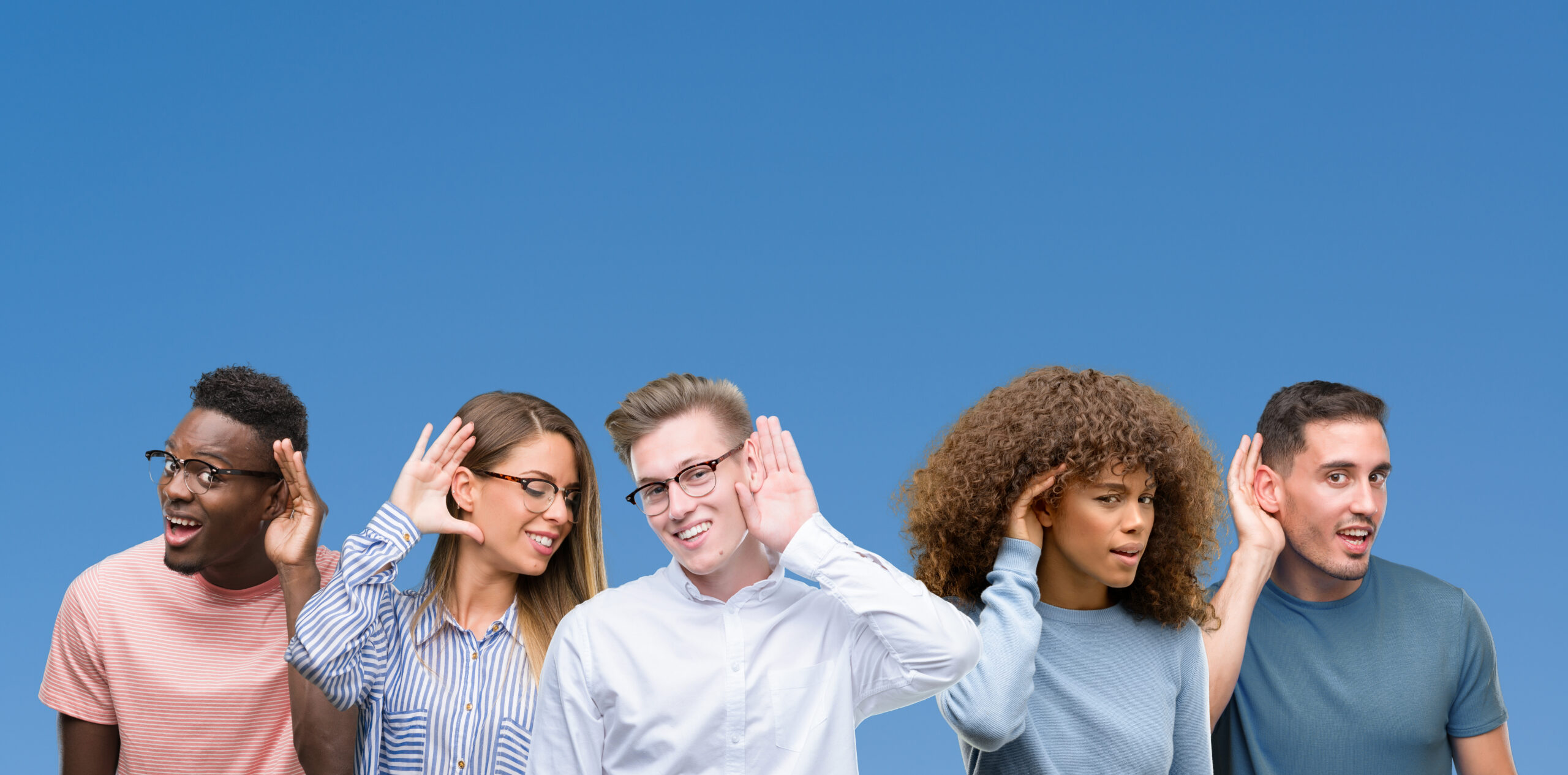 Composition of group of friends over blue blackground smiling with hand over ear listening an hearing to rumor or gossip Deafness concept