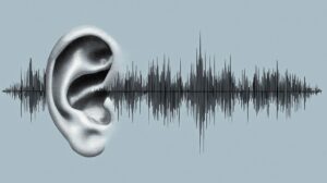 Stylized ear and sound waveform symbolize hearing screening, cochlear implant evaluation, and auditory diagnosis