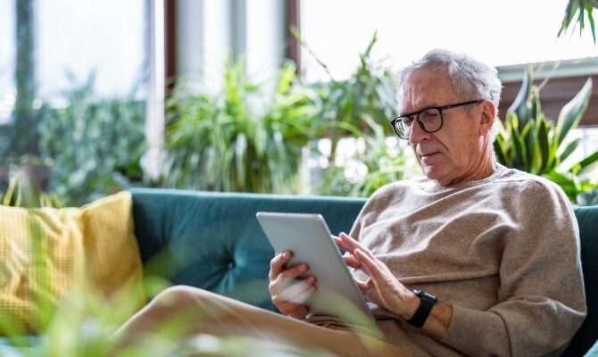 cta stacked senior man using tablet