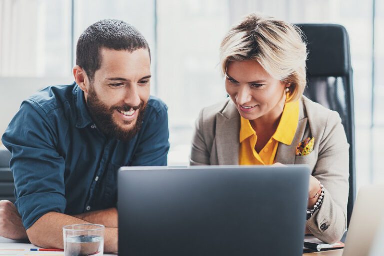 couple looking at laptop screen