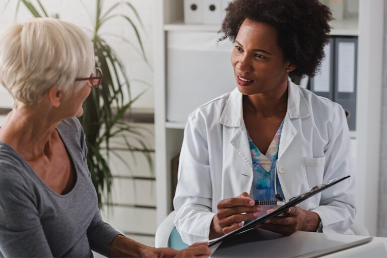 a hearing specialist talking with your patient