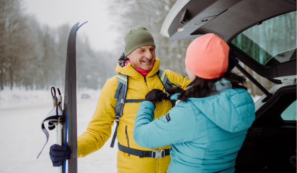 winter senior man skiing