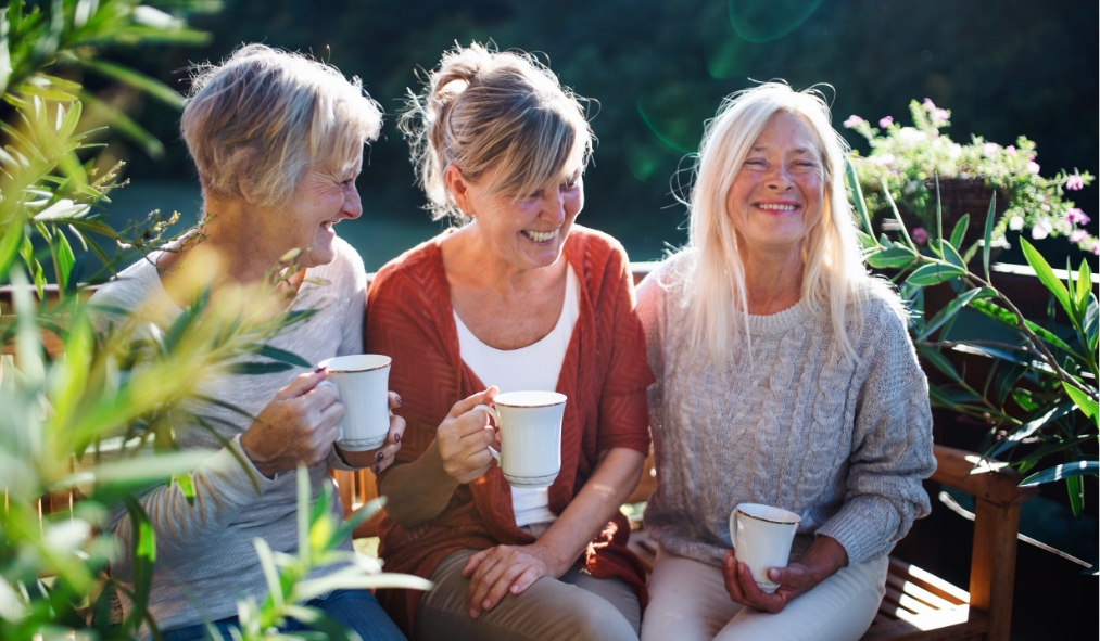 summer friends drinking tea coffee laughing