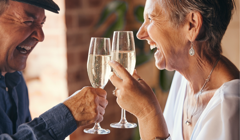 mature couple champagne toast