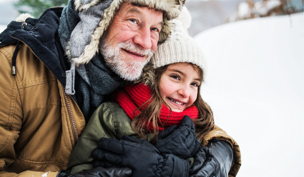 events winter grandfather granddaughter outside smiling