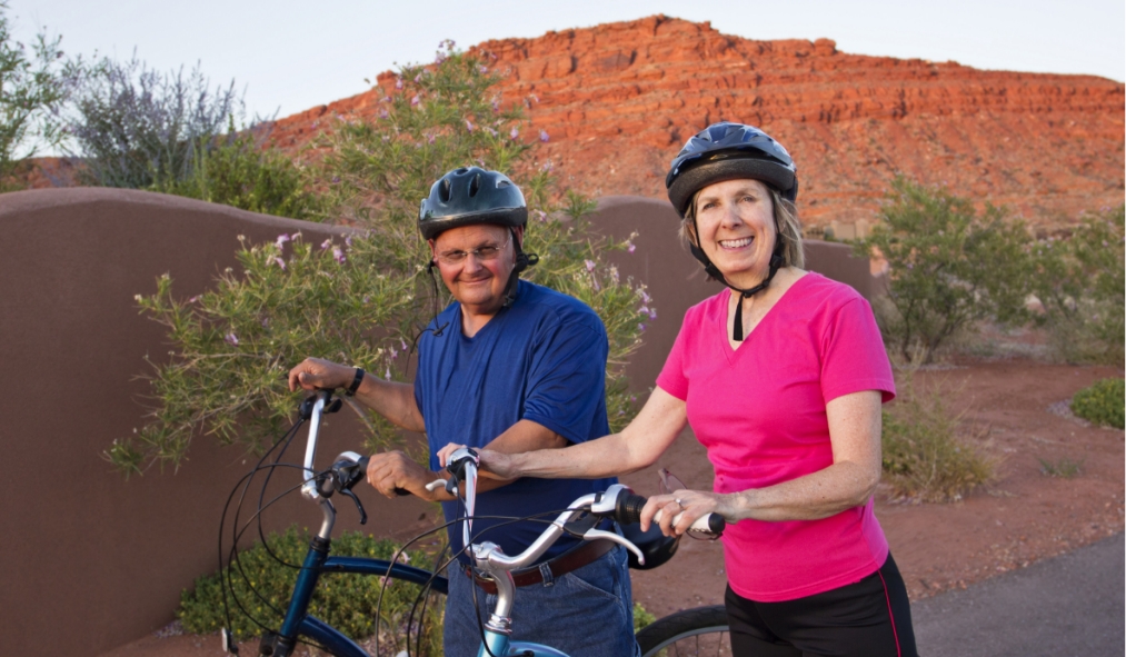 arizona older couple biking in mountains