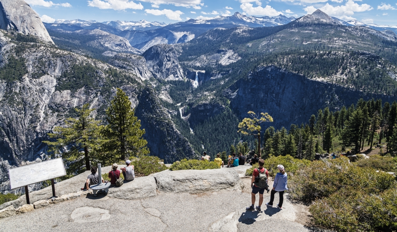 california People enjoying the view of Nevada and Vernal falls at Glacier Point