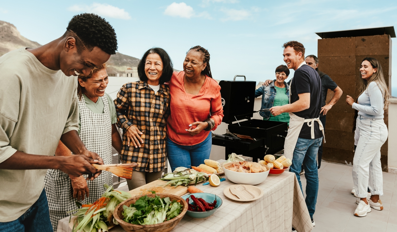 group of diverse friends having barbecue outside
