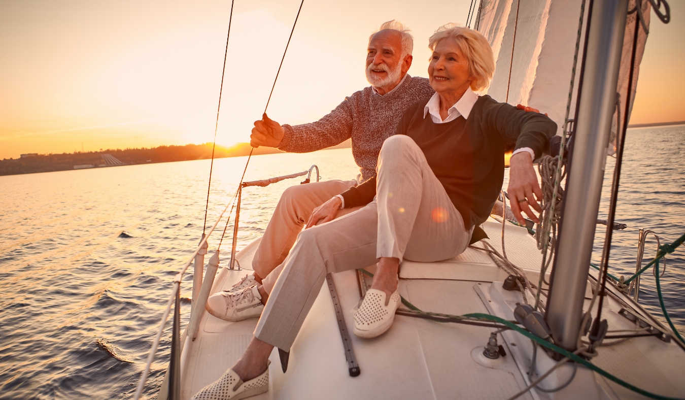 sitting on the side of sailboat or yacht deck floating in sea