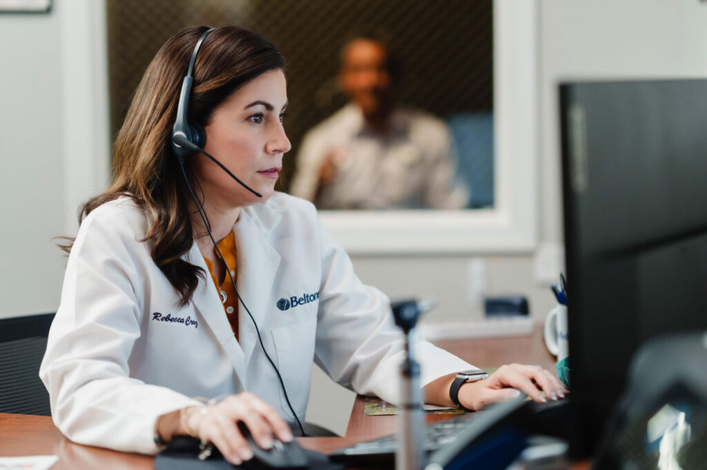 beltone hearing care provider using computer
