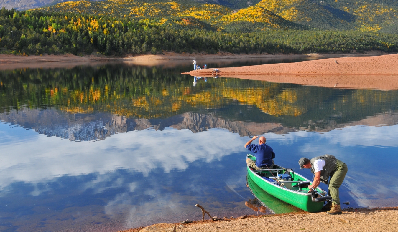 fishing at scenic reservoir lake