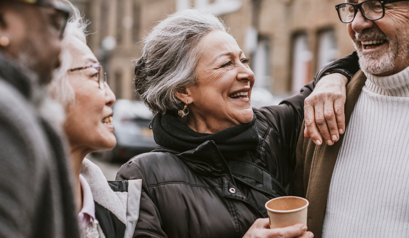 diverse old friends catching up during fall months